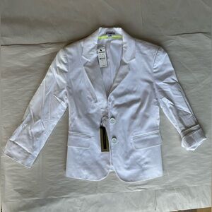 Woman’s white blazer